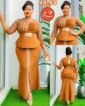This is a plawden brand by yellow two piece African wedding guest dress sets featuring a mermaid style top
